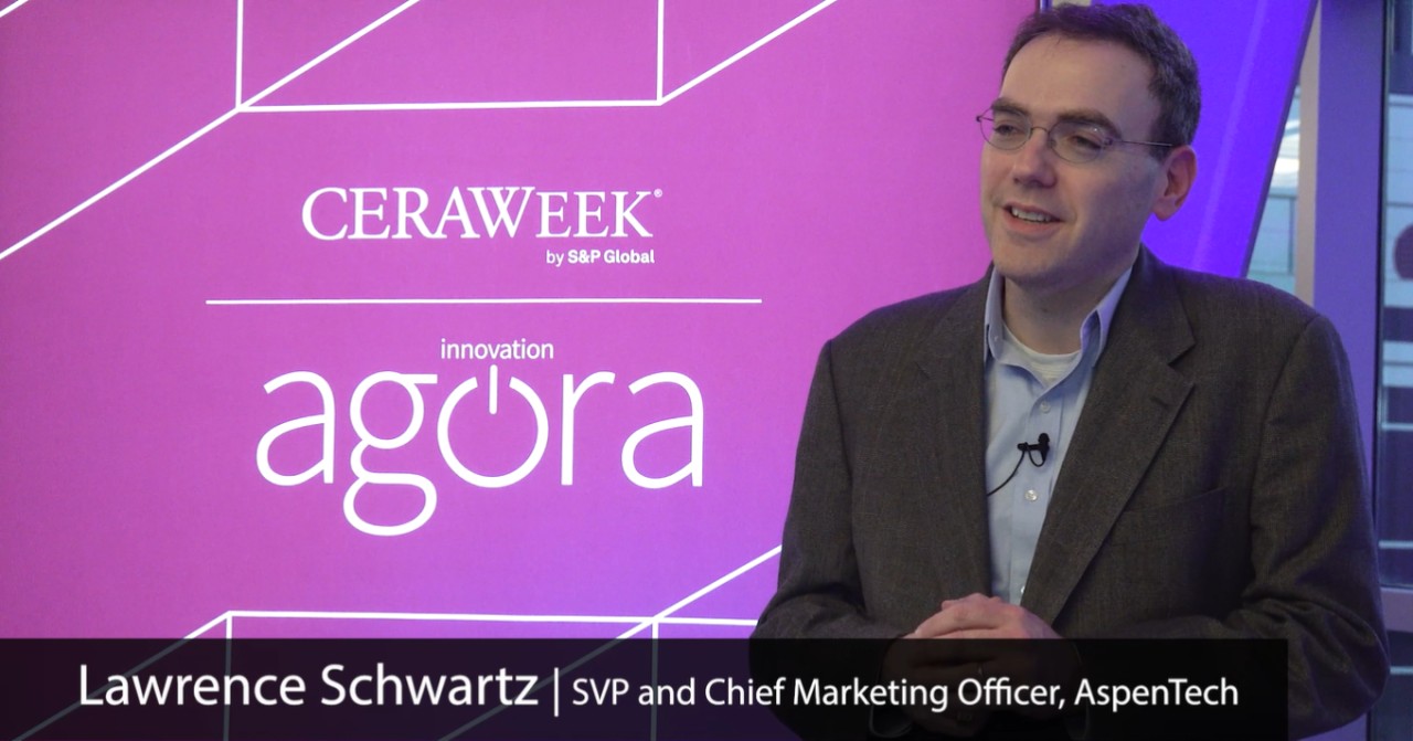 Lawrence Schwartz speaking on camera at CERAWeek while serving as AspenTech's chief marketing officer