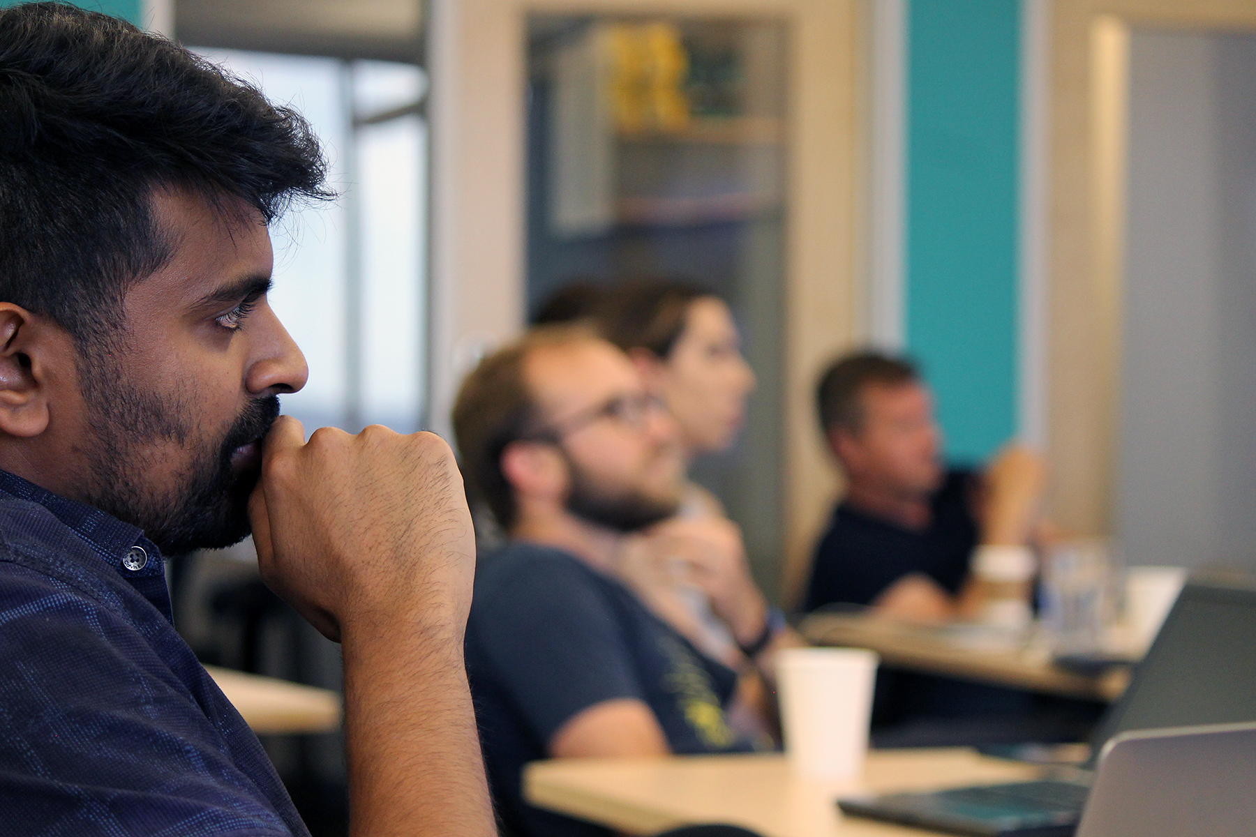 Participants listening during a Leading Cities program session