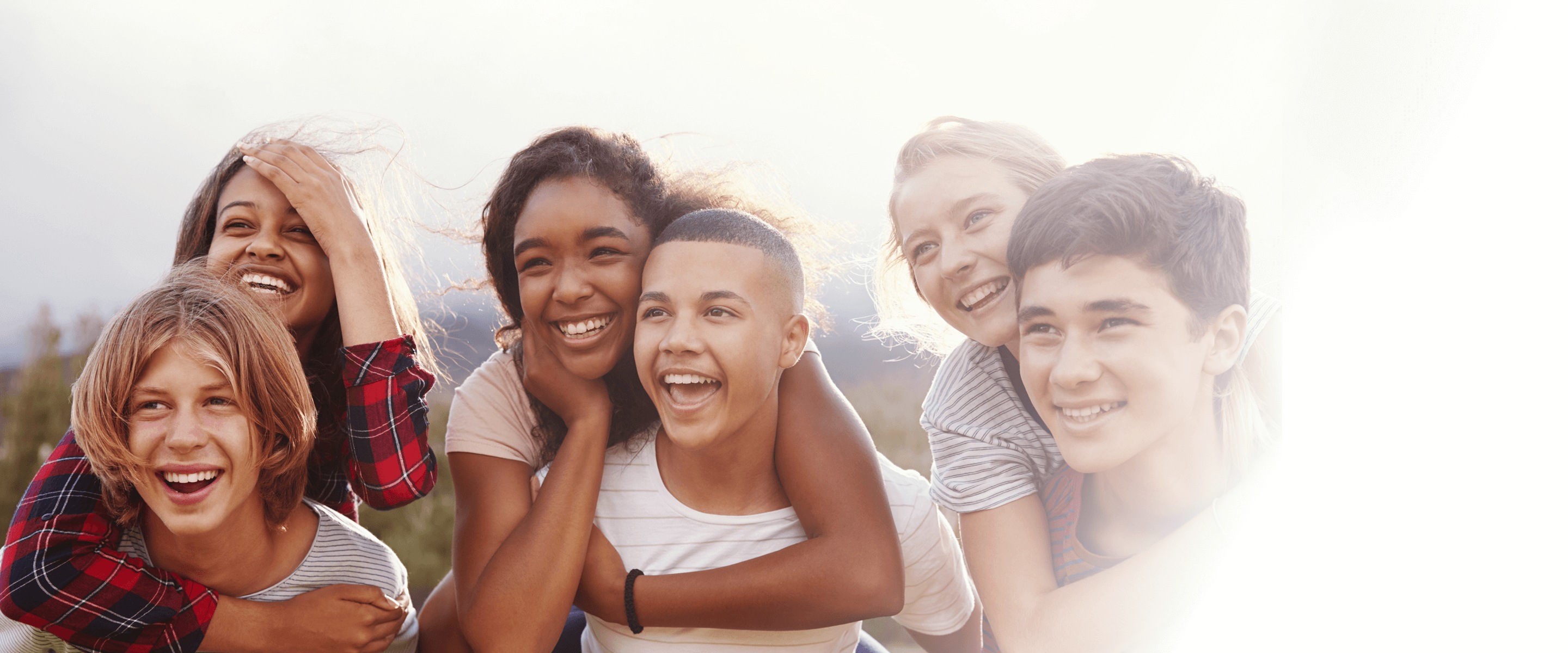 A group of young people outdoors in Learning Network’s promotional website photograph