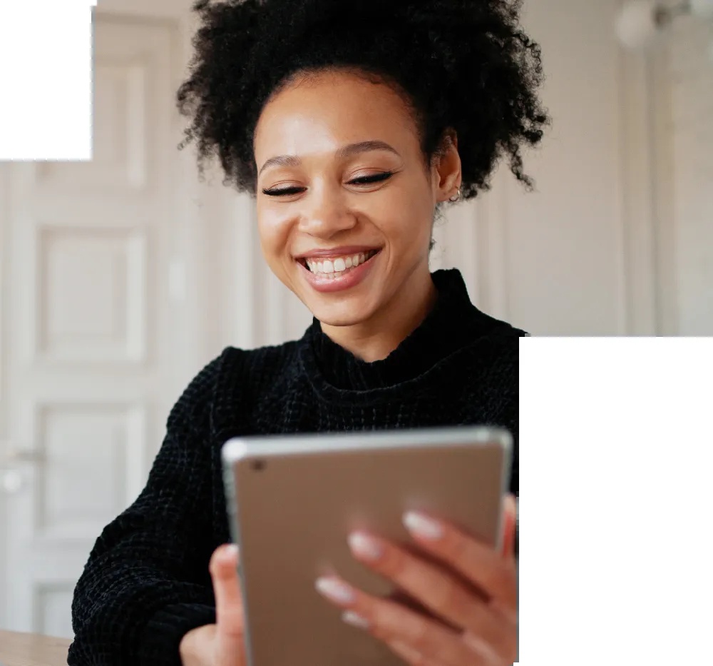 A woman using a tablet in Learnsoft’s mobile-learning marketing photograph
