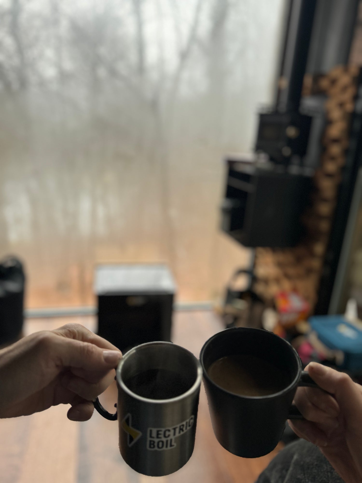 Two mugs of hot drinks prepared with the Overlander