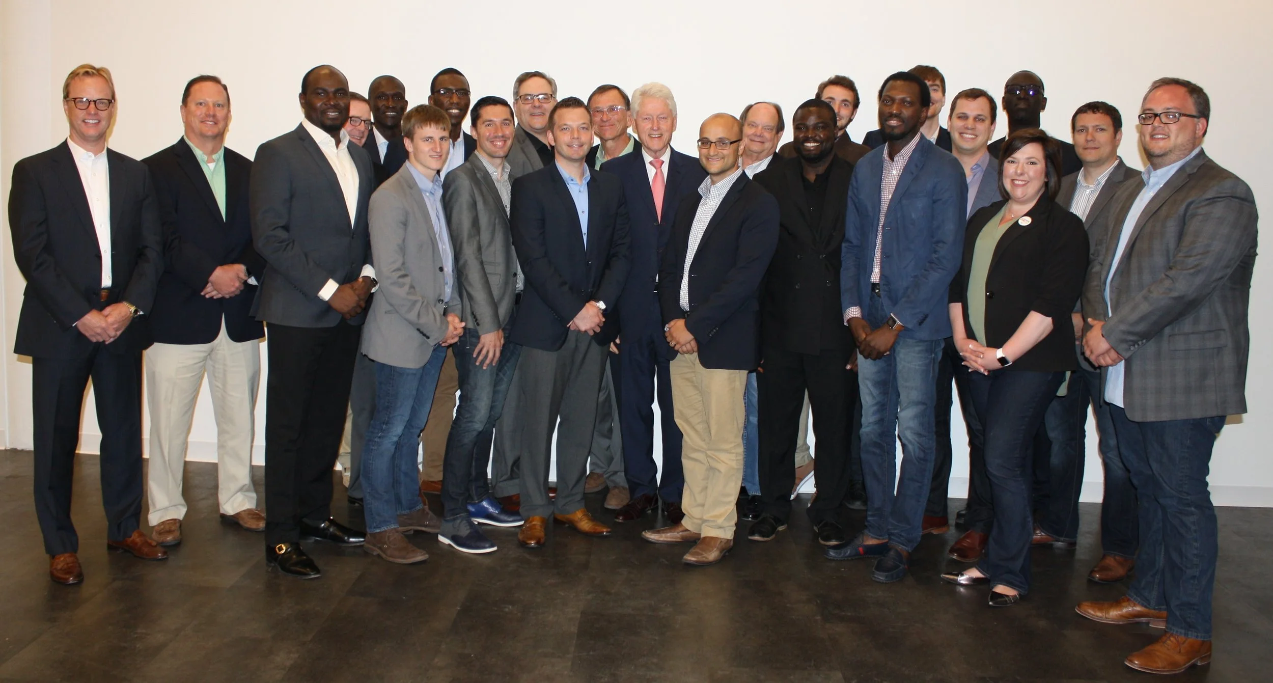 The 2016 VC FinTech founders with Bill Clinton and Lee Watson, standing at far right