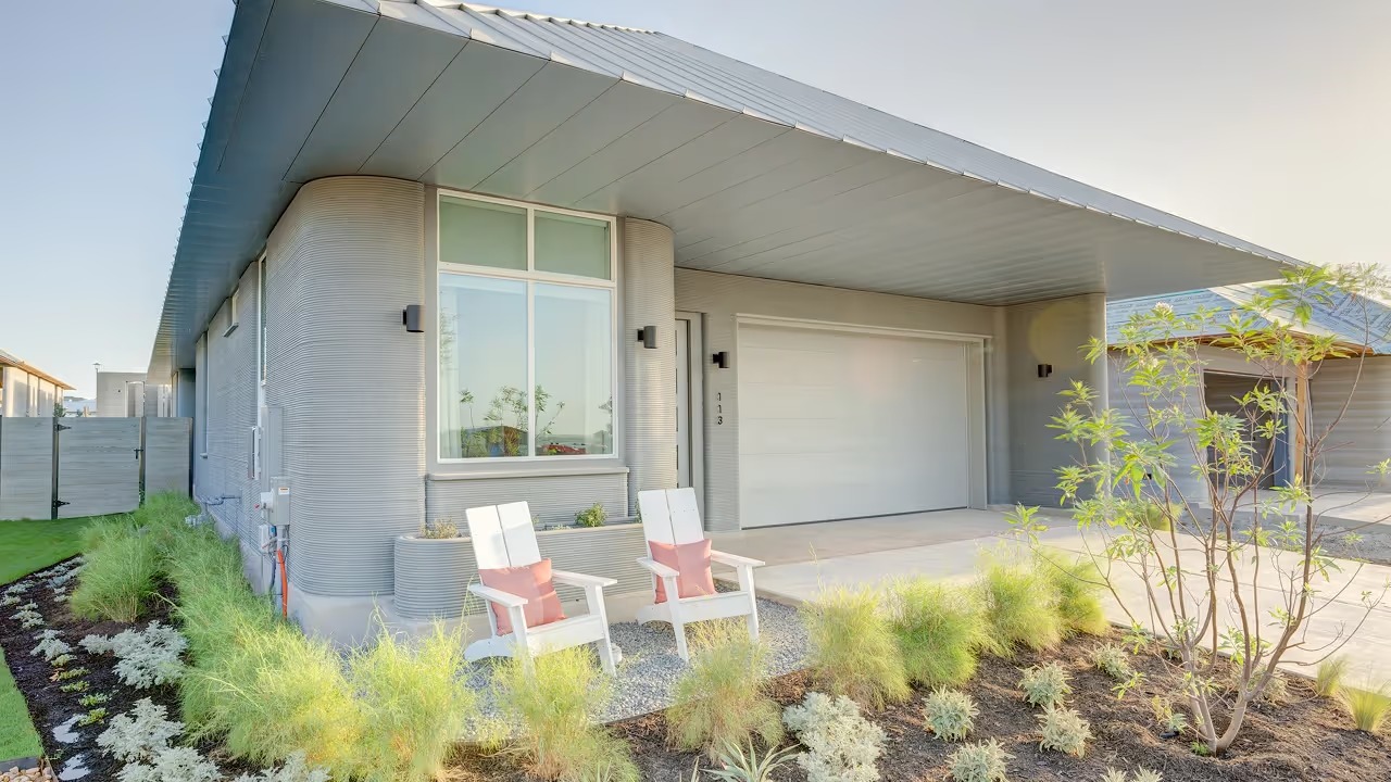 Wolf Ranch house with visibly layered printed walls, a covered entrance and a garage