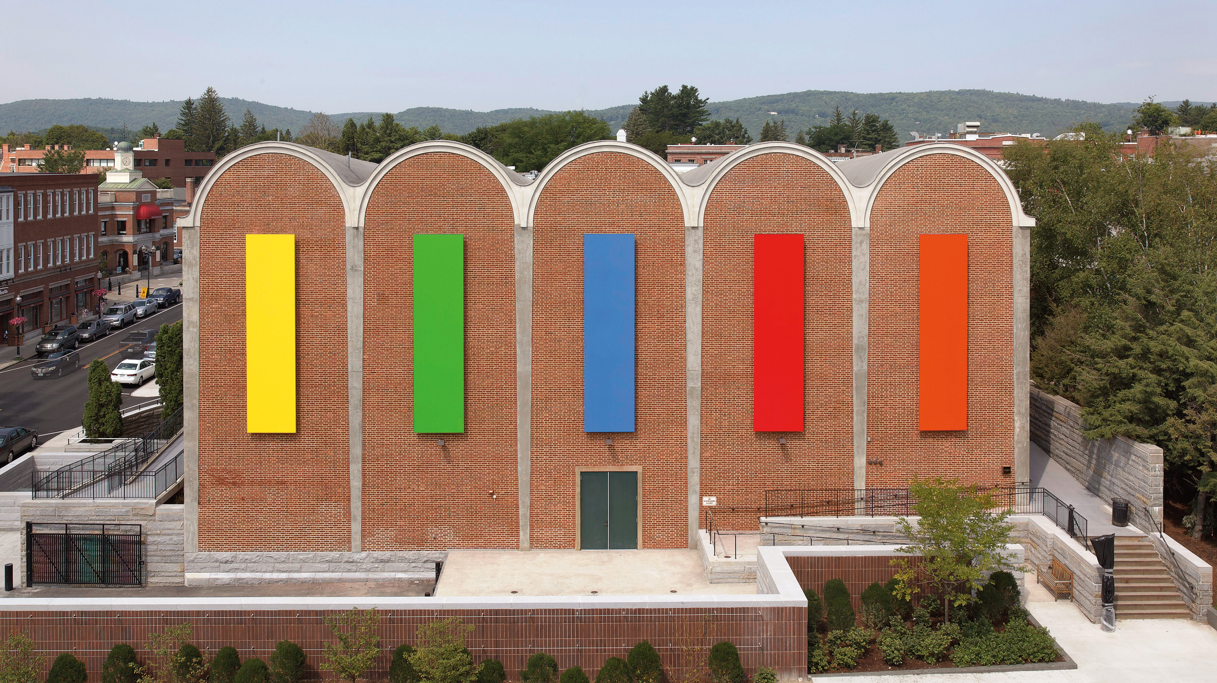 Ellsworth Kelly’s five brightly colored Dartmouth Panels installed on the exterior of a brick building