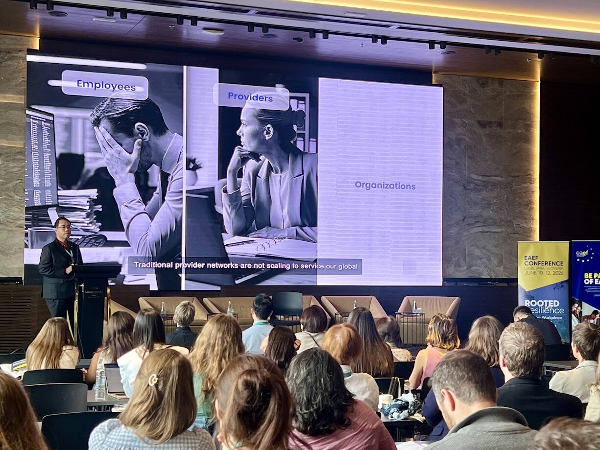 Leon CK Leong presenting to an audience at the 2026 EAEF conference in Ljubljana