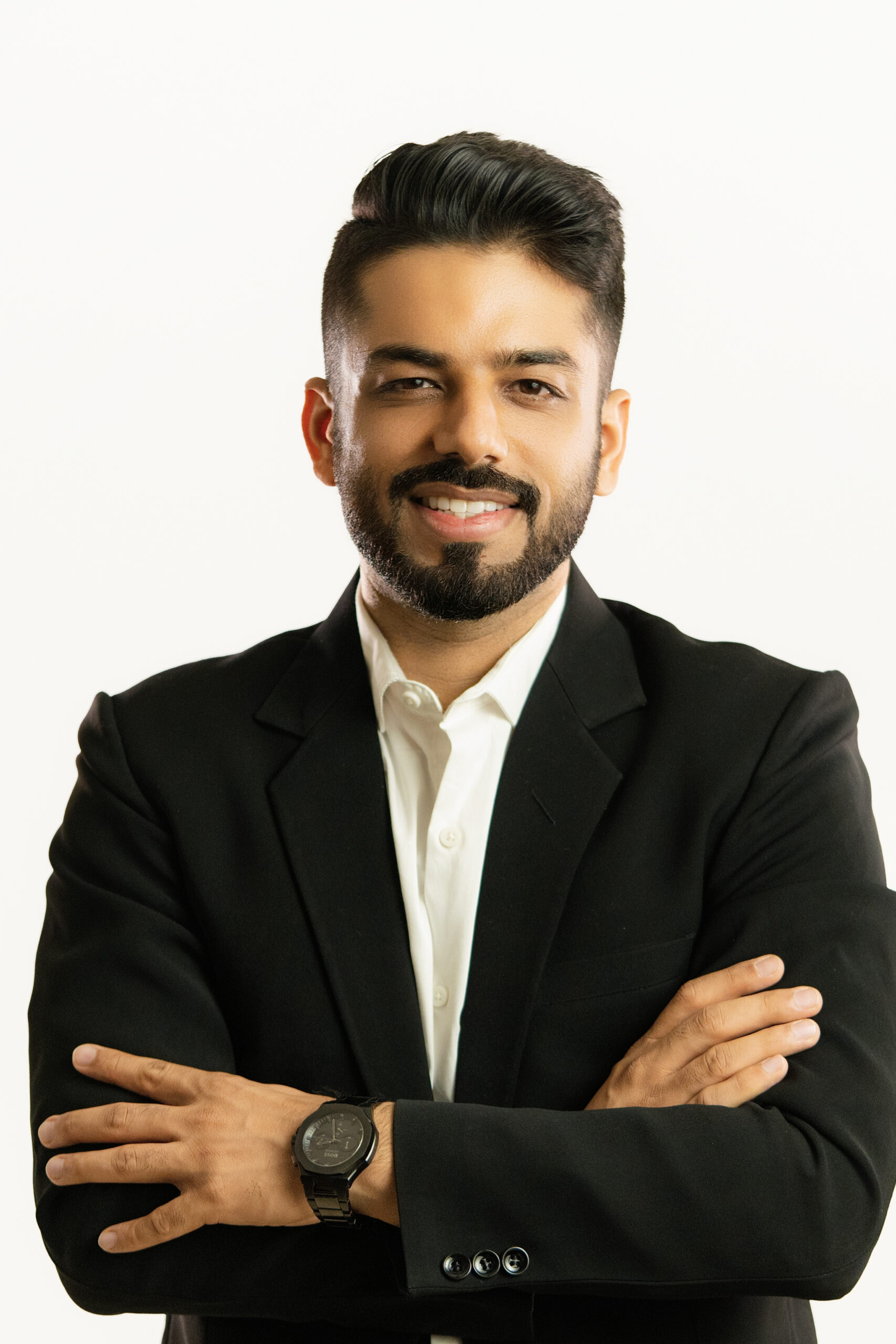 Level Up PR founder Sahil Sachdeva in a black suit