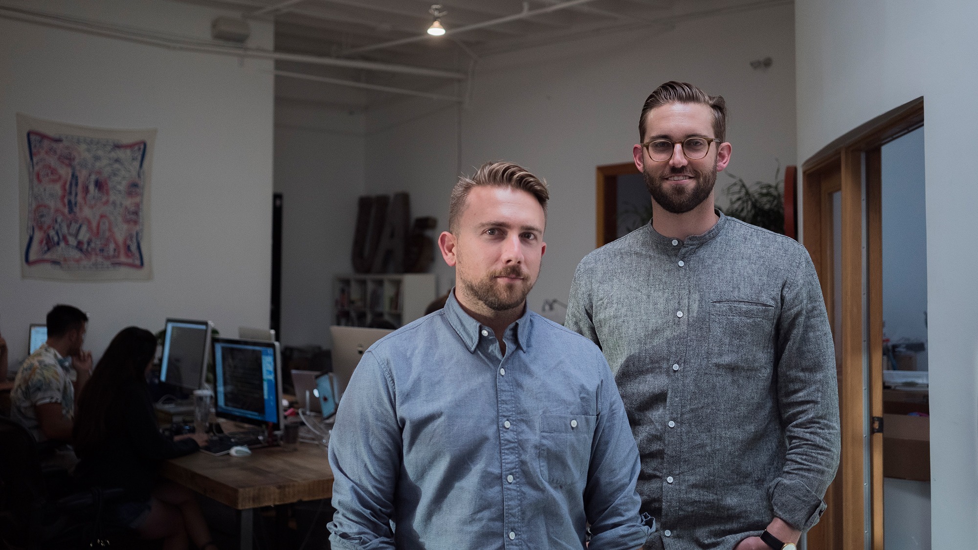 Levi Brooks and Jason Farrell standing together in the Use All Five studio