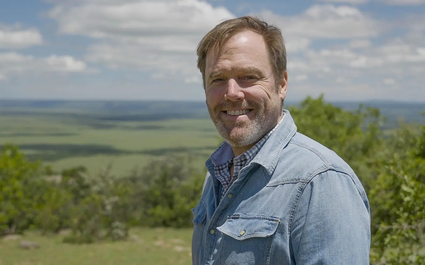 LGT Venture Philanthropy CEO Oliver Karius outdoors in the Mara landscape