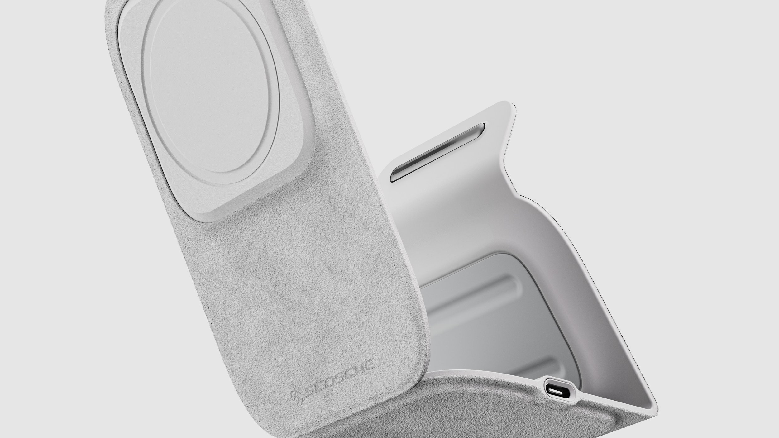 A pale fabric-covered Scosche wireless charging stand designed by Lifestyledesign