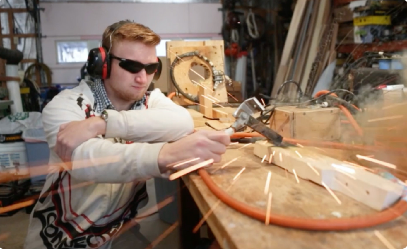 A student welding in a career and technical education program