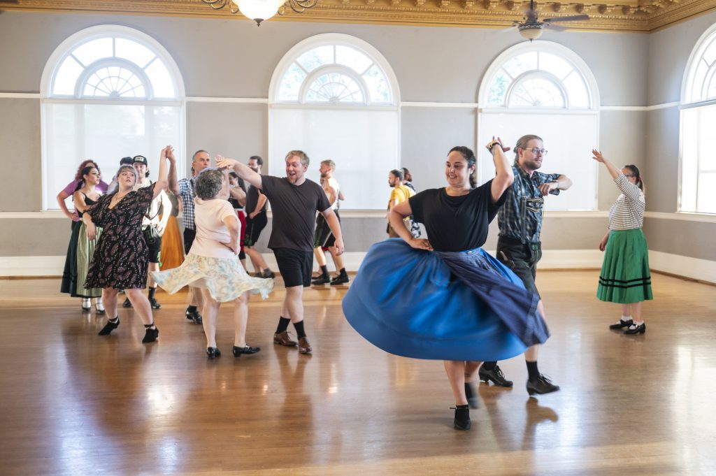 Alpentänzer dancers turning with their partners at a Sacramento Turn Verein rehearsal instructed by Lila Wallrich