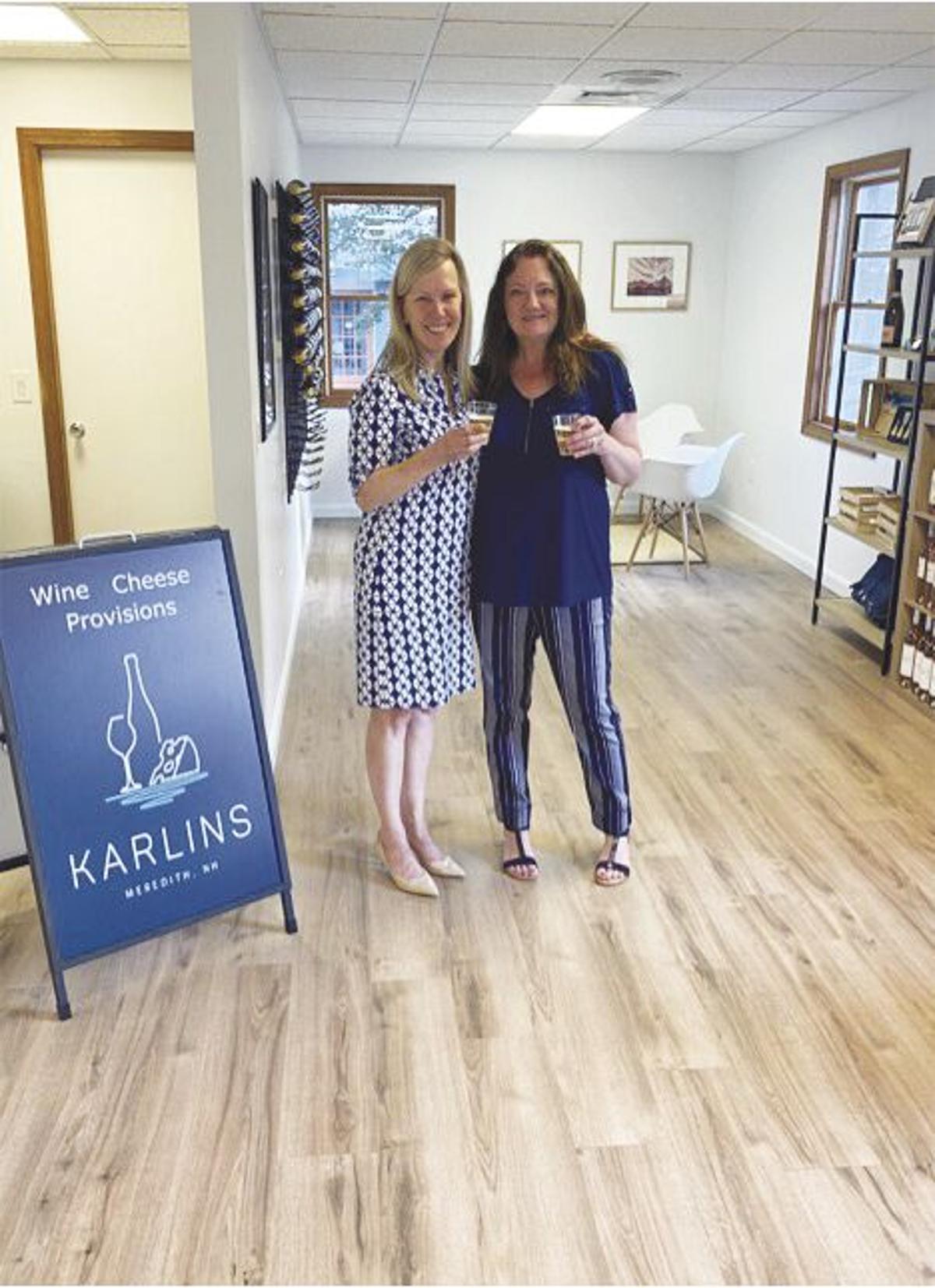 Linda Brown and Karen Simonenko standing inside KARLINS Wine, Cheese and Provisions in Meredith, New Hampshire