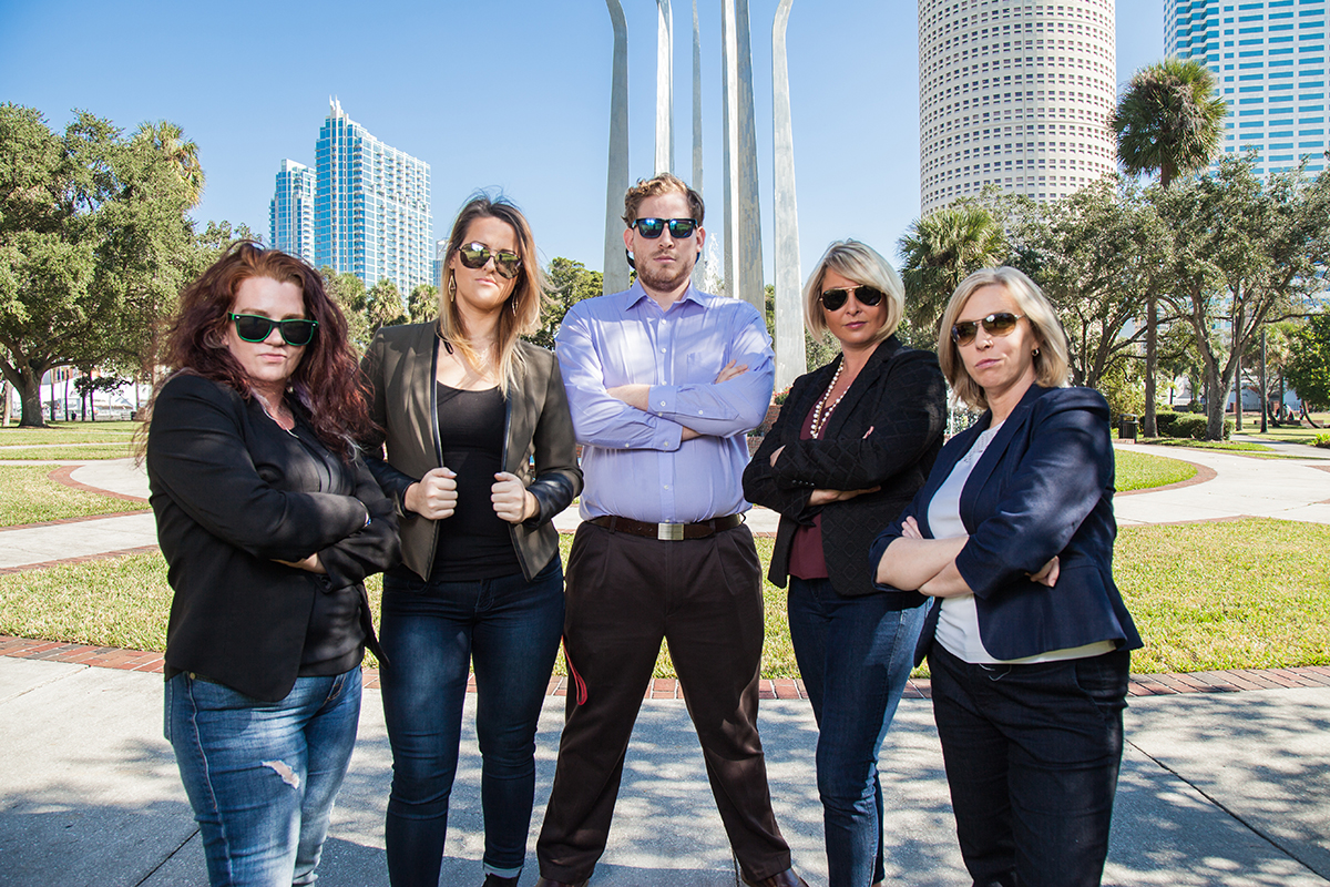 Linda Olson with fellow Tampa Bay Wave team members outdoors in downtown Tampa