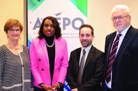 Linda Savard with Mitzie Hunter, Jean-François L’Heureux and Jean-Marc Aubin at an education-sector gathering