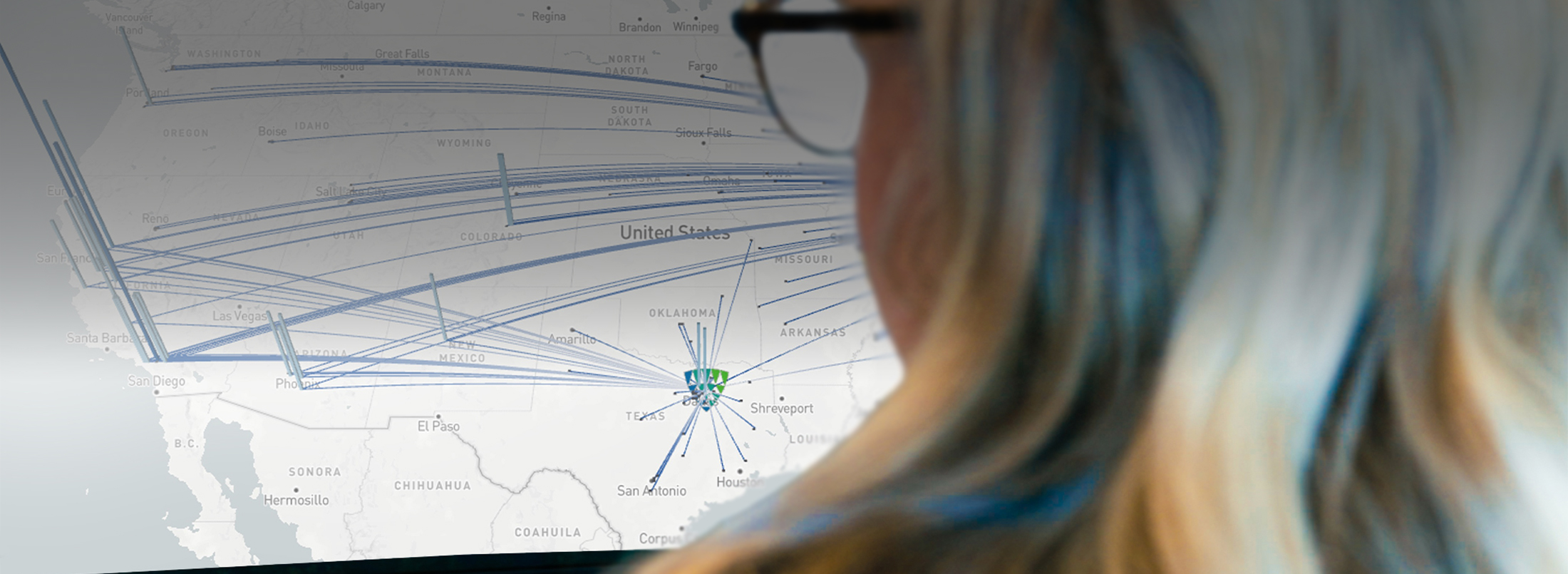 Lineage team member examining a map of United States transportation routes