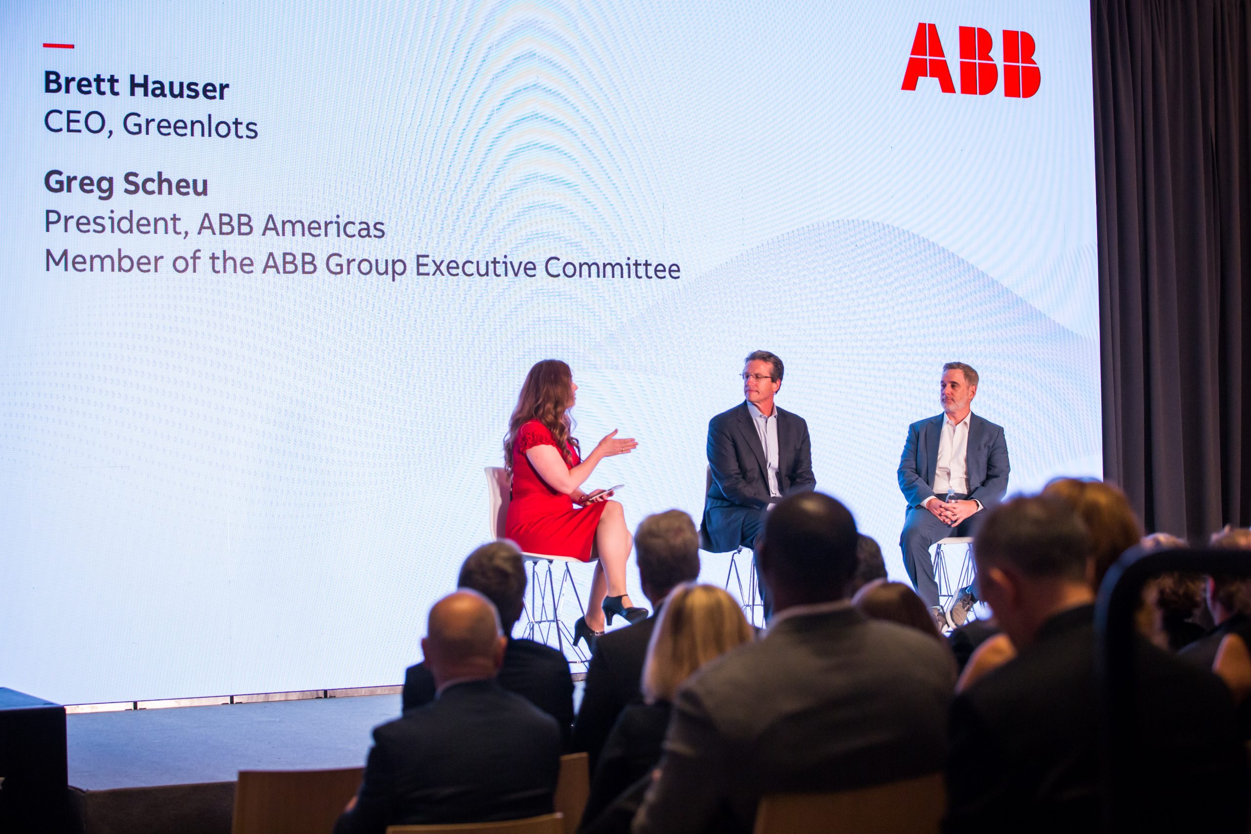 Lisa Ann Pinkerton moderating an ABB discussion with Brett Hauser and Greg Scheu in front of an audience