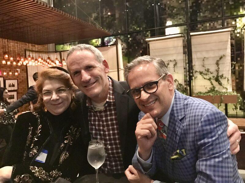 Lisa Burns, at left, smiles with two companions in a candid group photograph shared by Jim Weiss.