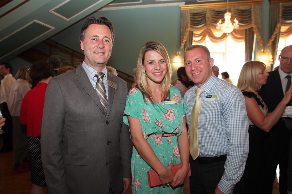 Lisa Cottrell standing between Rob Janus and Bobby Shafer at a Victoria Foundation event in 2013
