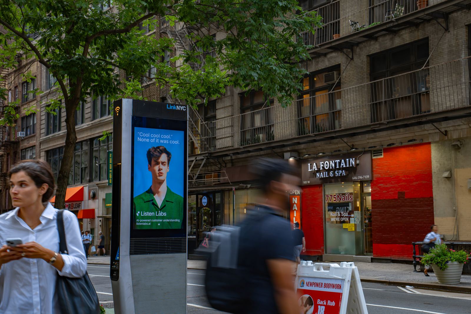 A Listen Labs advertisement on a New York City street screen