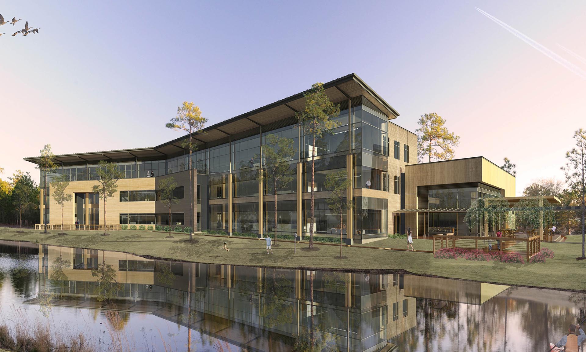 The Grove building at Live Oak Bank set among trees beside the lake