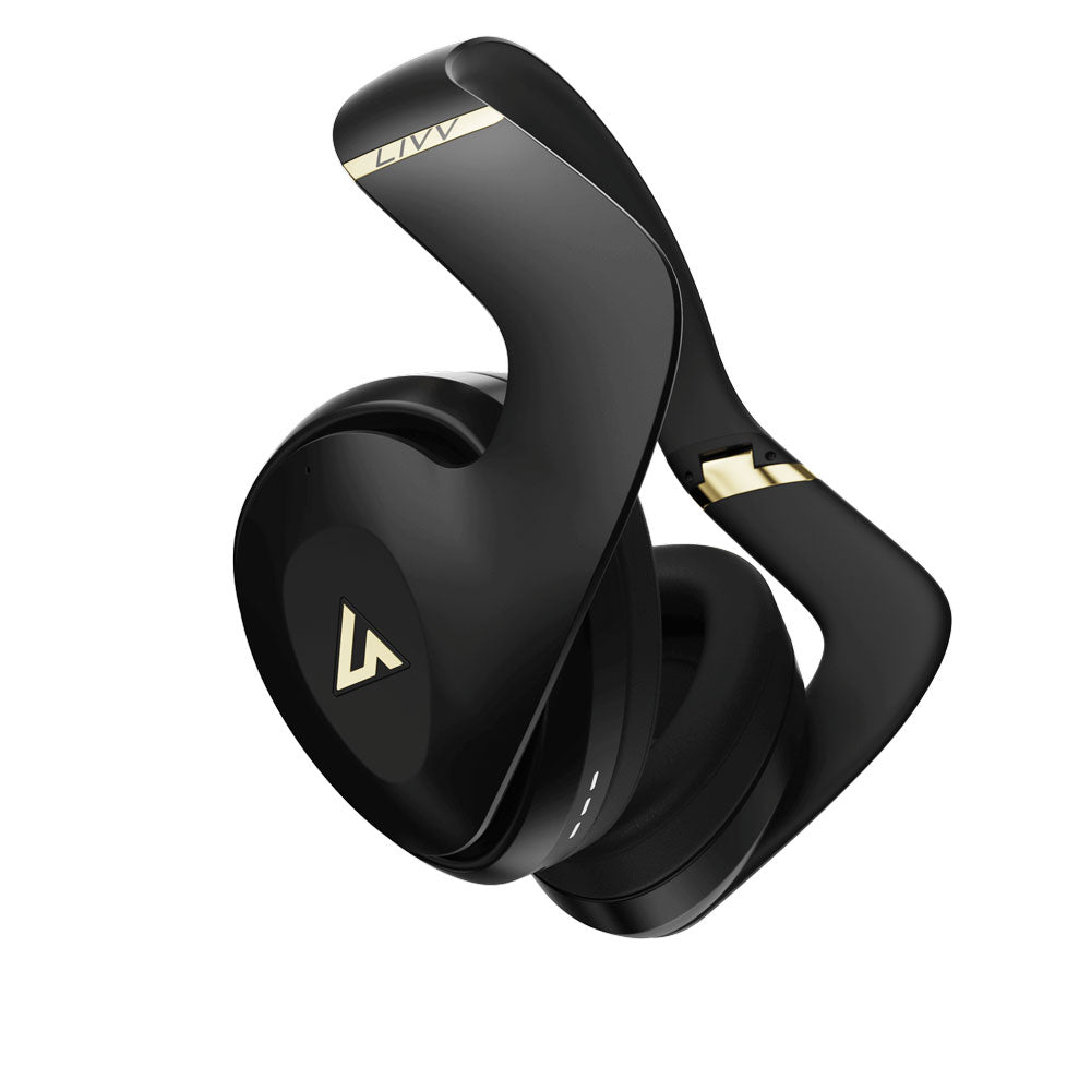 Black and gold LIVV Pro over-ear headphones folded against a white background