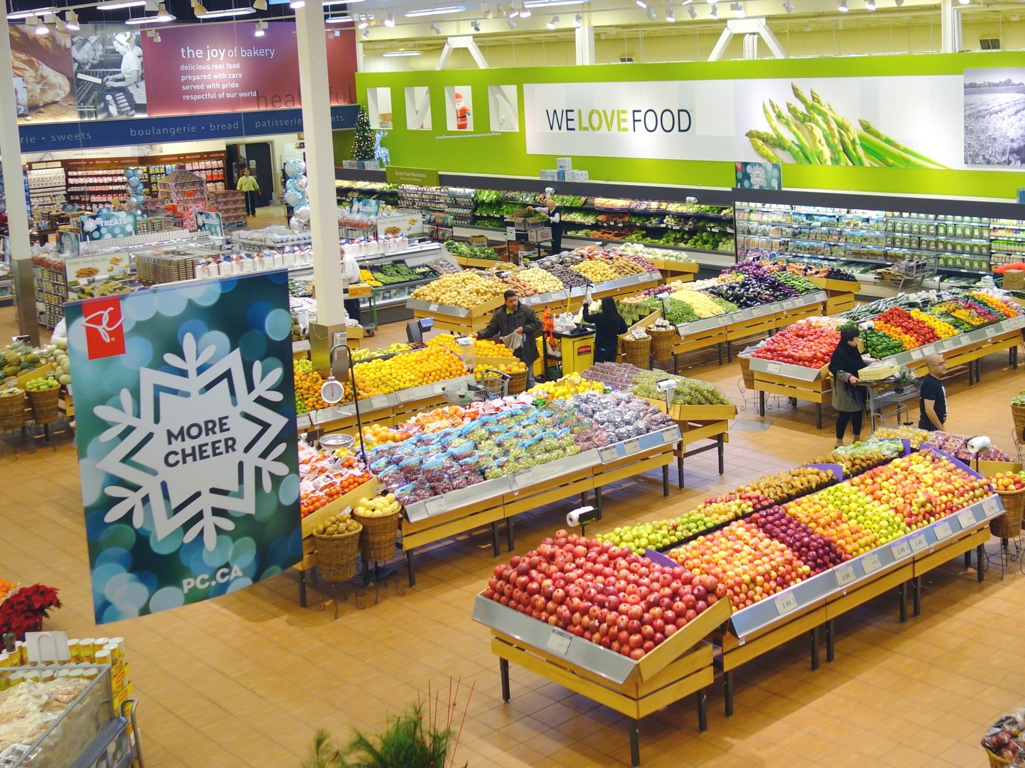 Inside a brightly lit Loblaws produce department