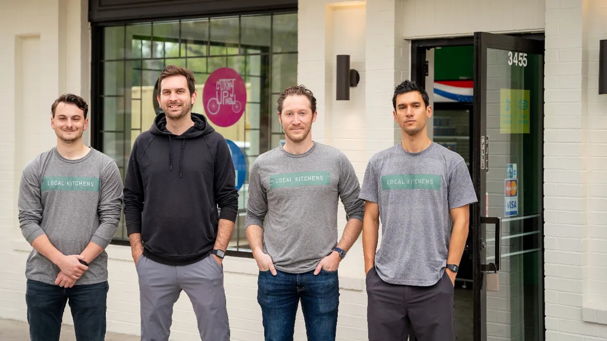 Local Kitchens’ early leadership team standing together outside