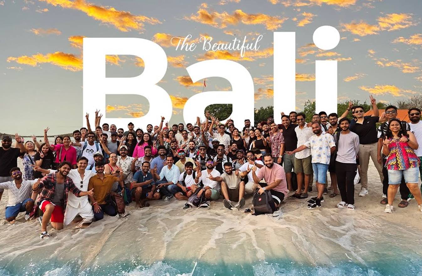 LogiNext team gathered on a beach during the company’s Bali offsite, pictured in its 2025 review