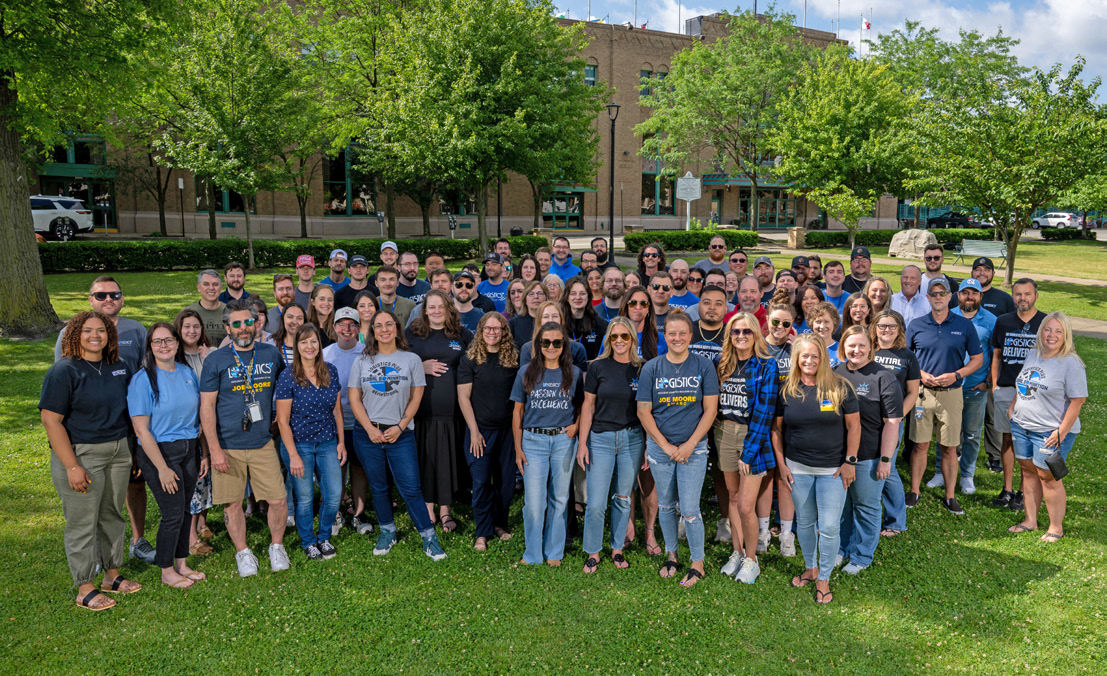 Logistics Plus headquarters employees gathered outside Union Station in Erie