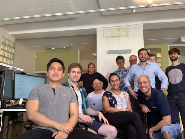 Lorenzo Consoli seated at the front right with the early NuvoAir team in their office