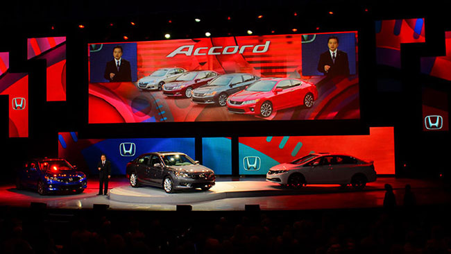 Honda Accord event featuring cars onstage beneath coordinated widescreen presentation graphics