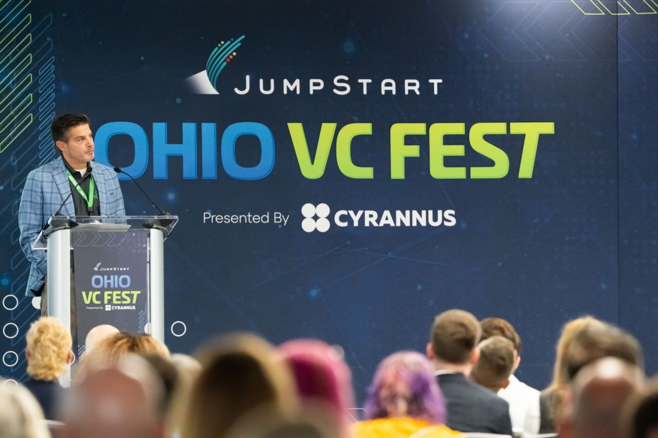 Lorne Novick opening Ohio VC Fest at a lectern in front of an audience