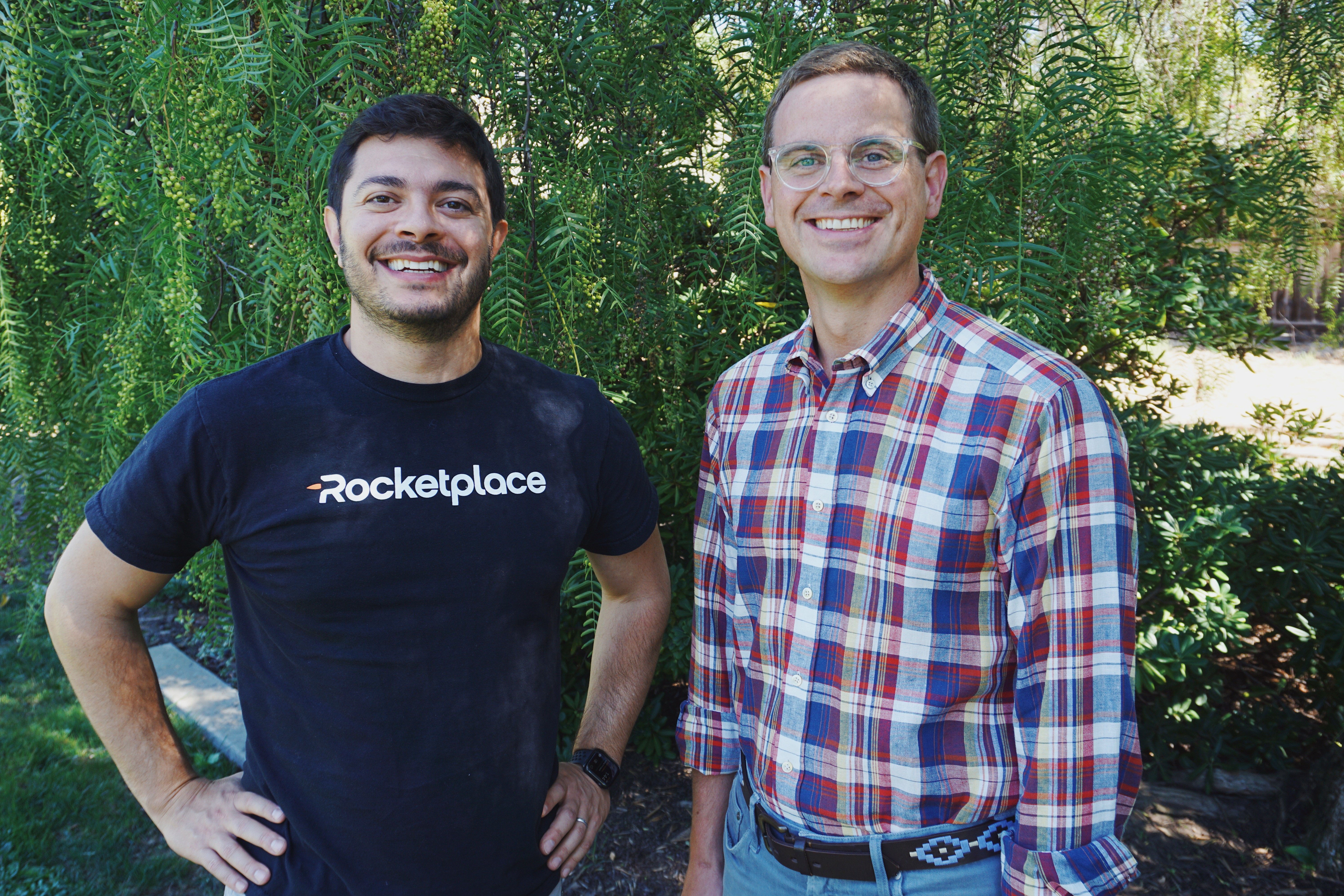 Rocketplace co-founders Louis Beryl and Ben Hutchinson standing together outdoors