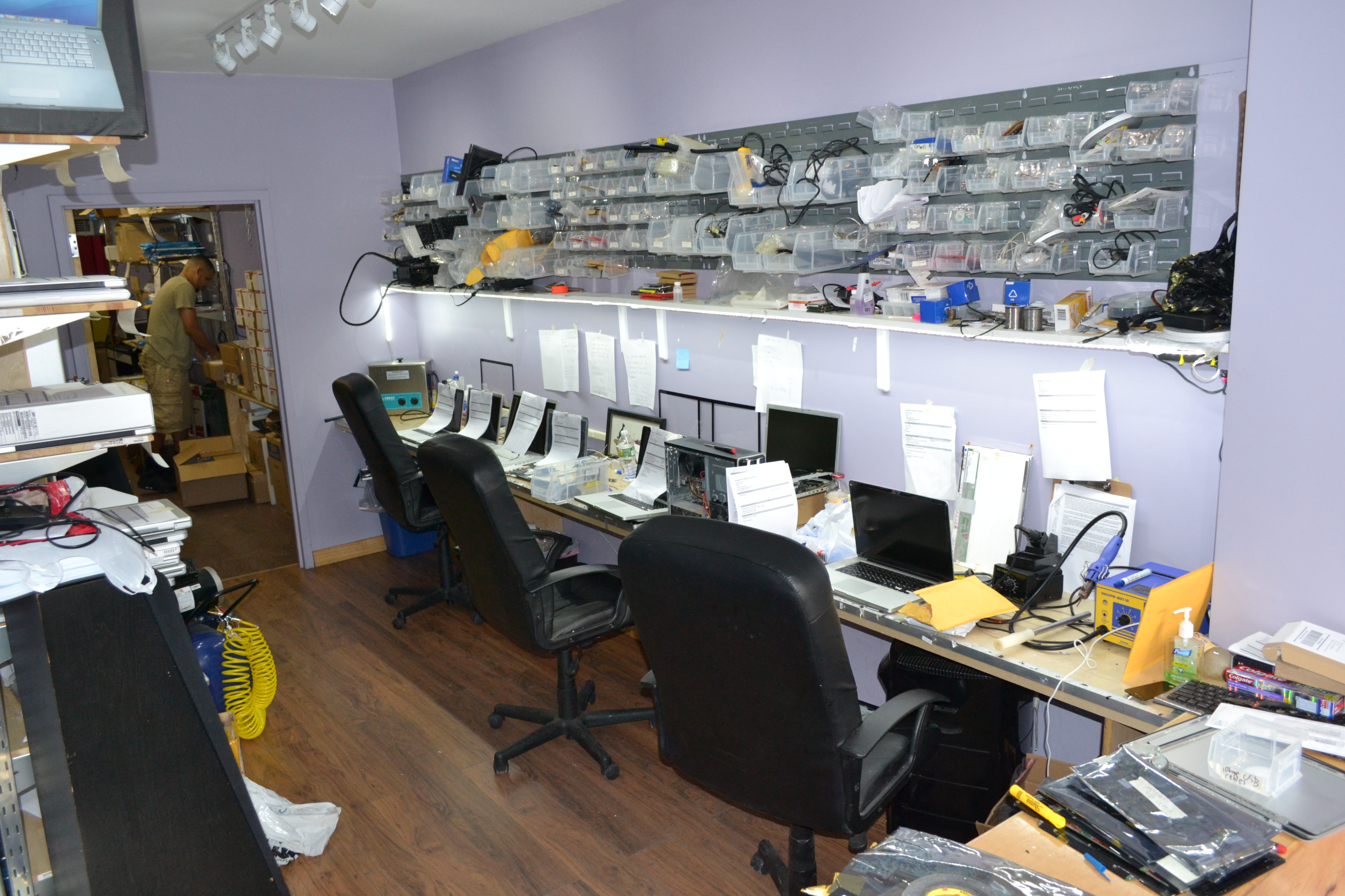 The early Rossmann repair bench with tools and electronics