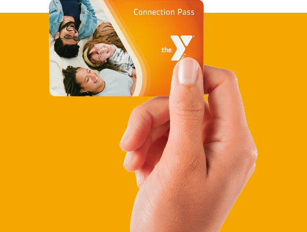 A hand holding the YMCA Connection Pass campaign card