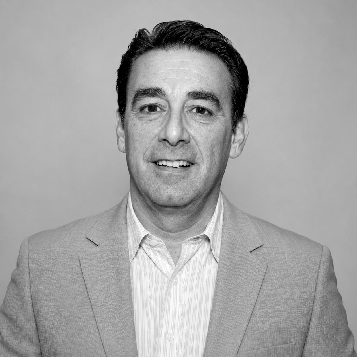 Black-and-white portrait of LRG Chief Creative Officer Vince Galdi