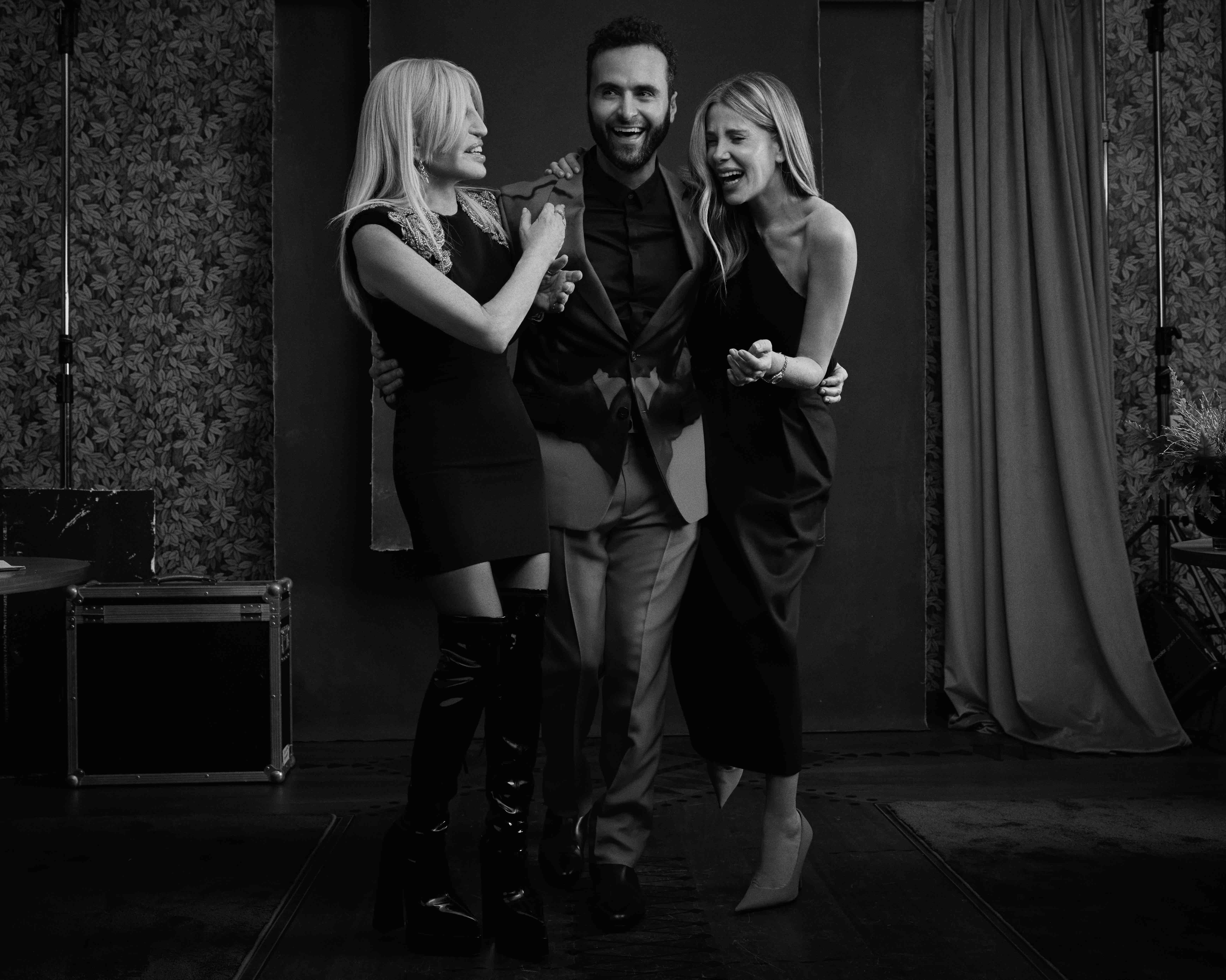 Donatella Versace, Lucio Di Rosa and Alessia Marcuzzi laughing together