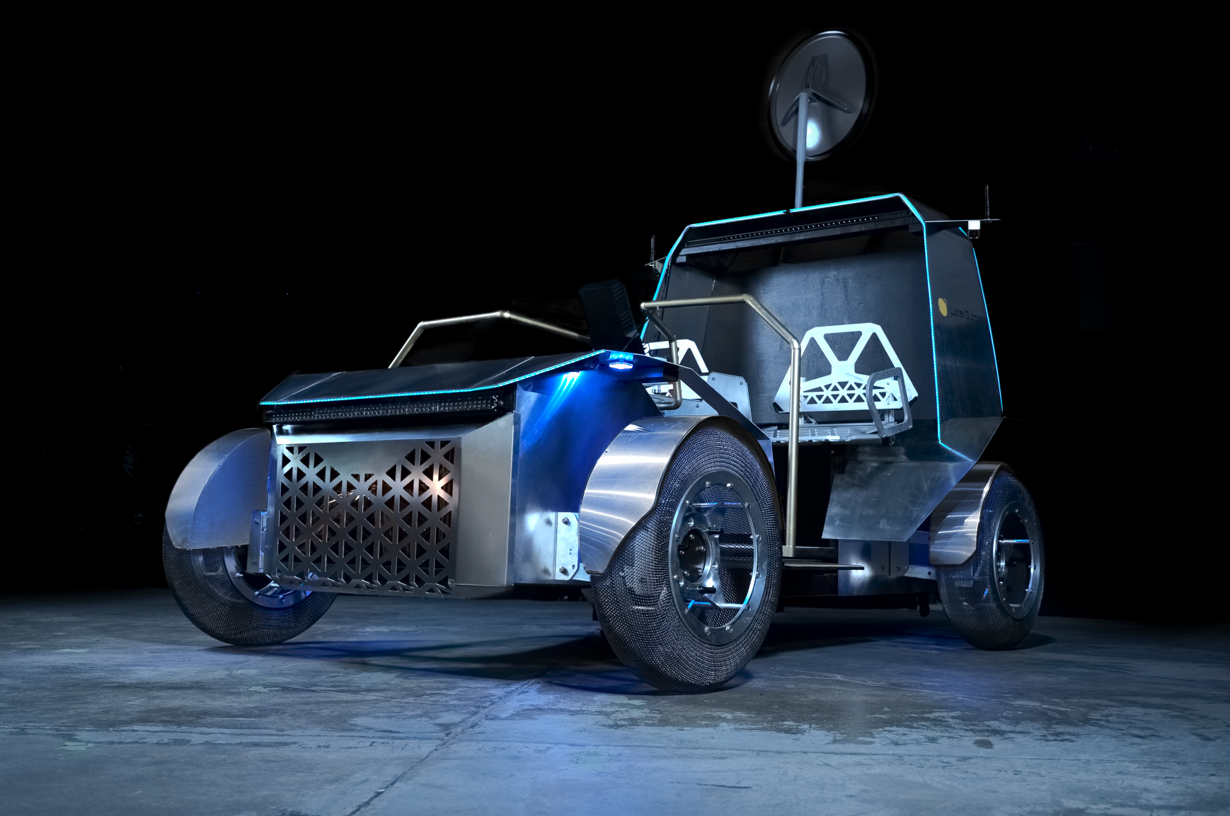 Lunar Outpost Pegasus vehicle with two open seats, mesh wheels, and a communications dish