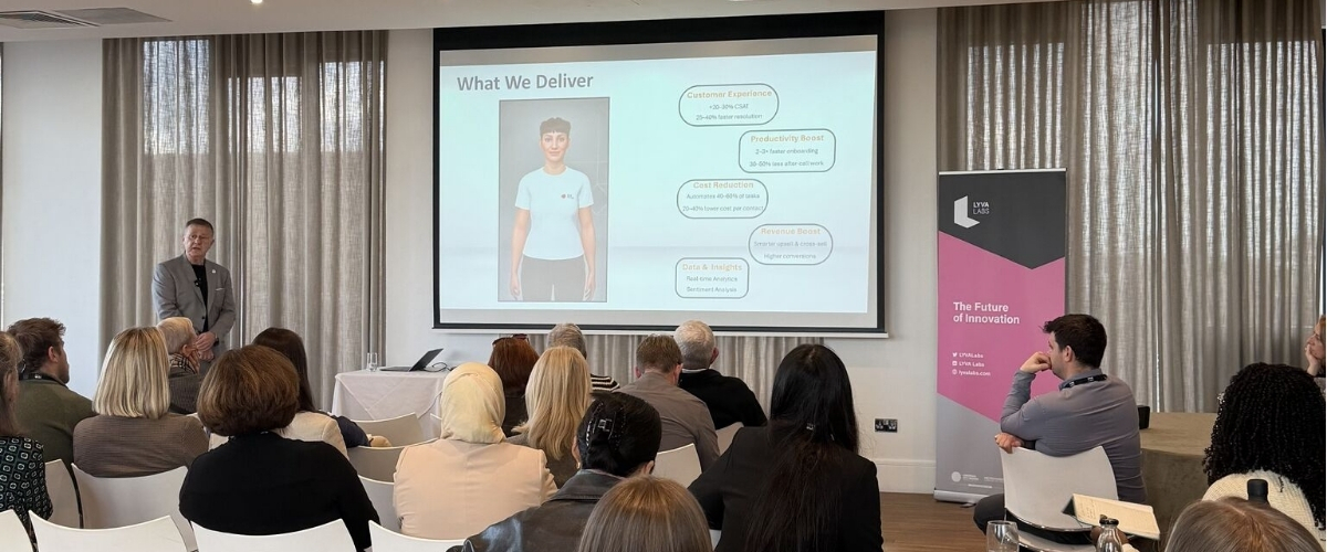 A Sum Vivas presenter pitches to a seated audience at LYVA Labs Demo Day 2025