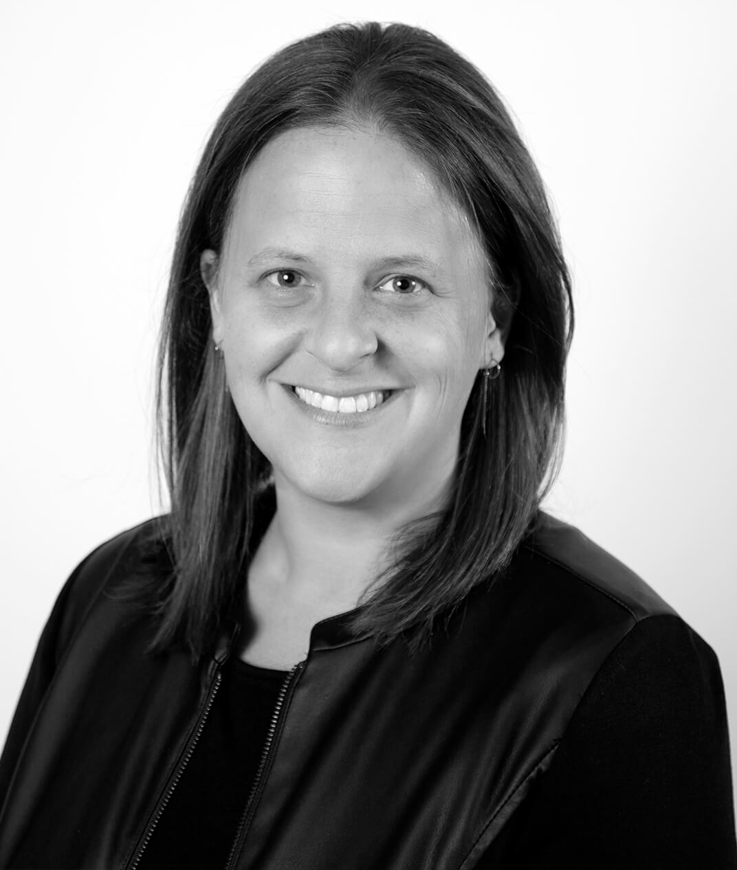 Black-and-white portrait of M Booth Health CEO Stacey Bernstein
