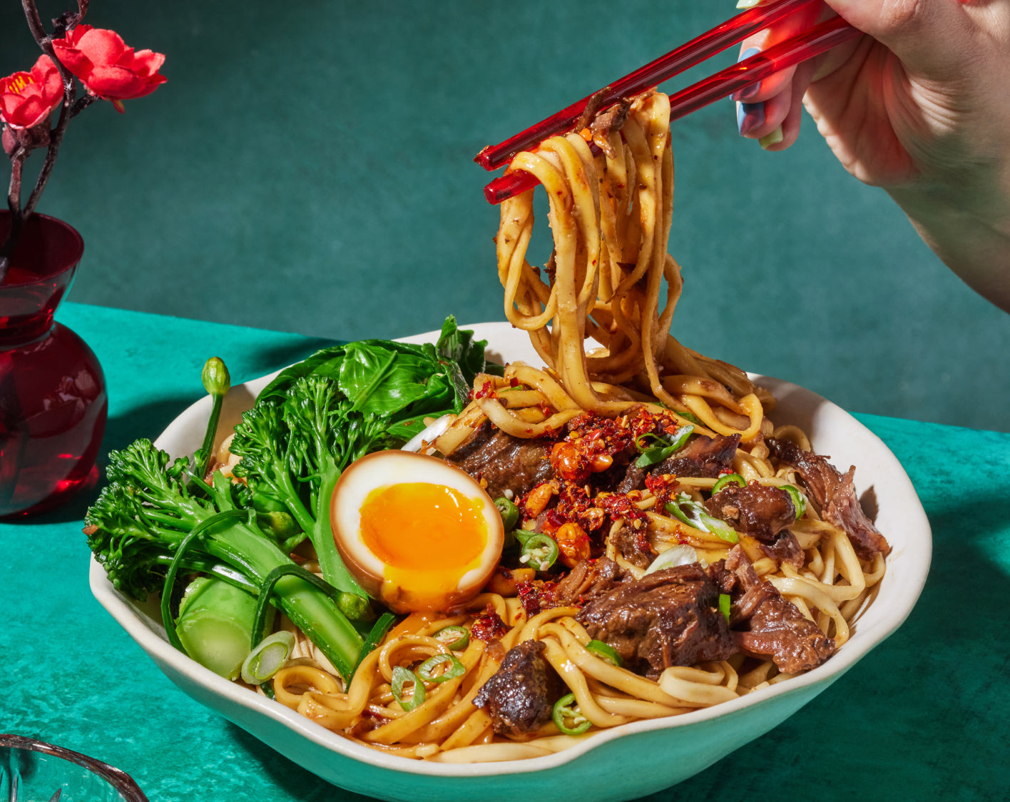 MìLà braised beef noodles in a bowl