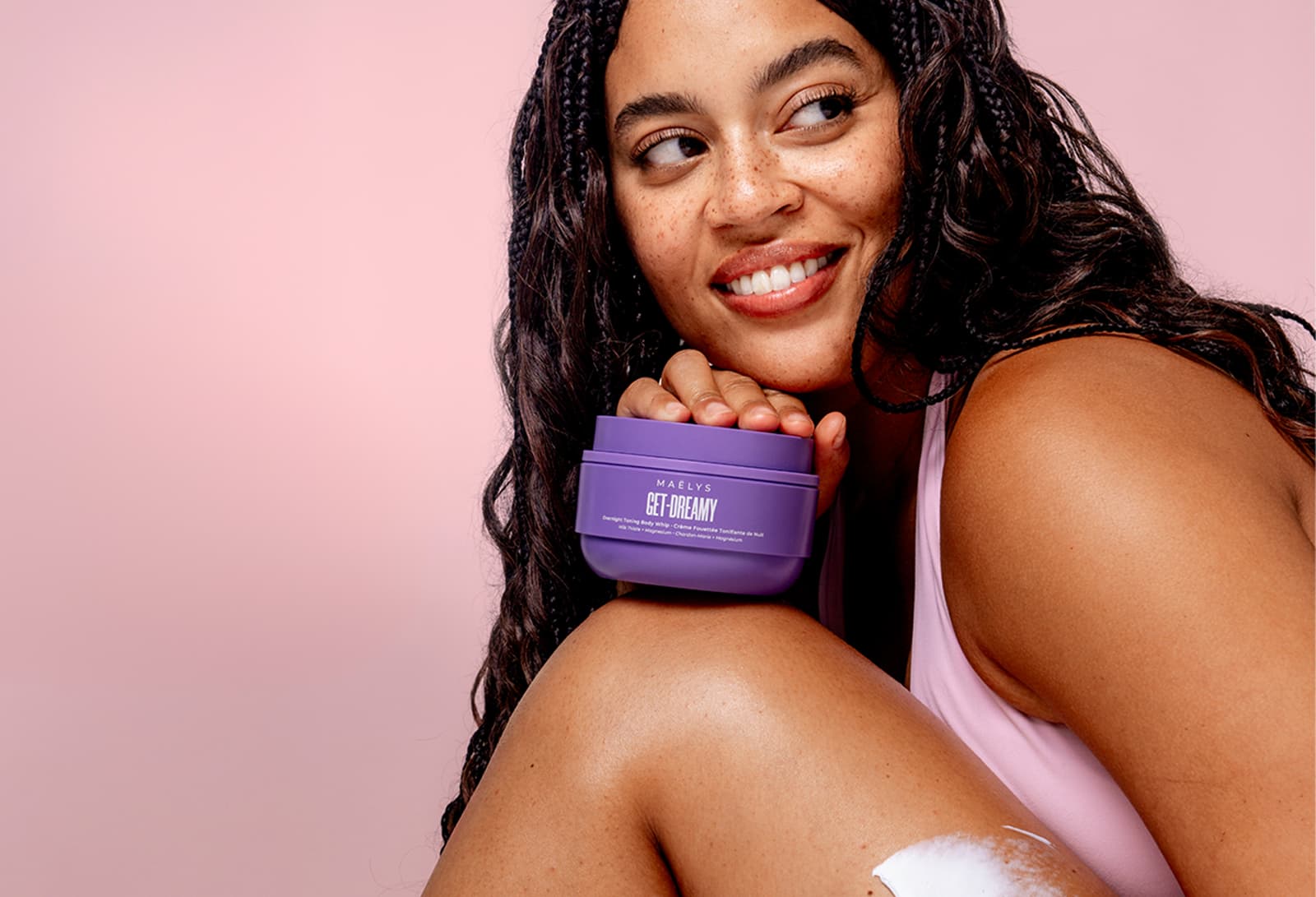MAËLYS campaign model holding a purple GET-DREAMY body whip jar