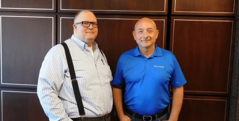 MAANA co-founders Donald Thompson and Babur Ozden standing together