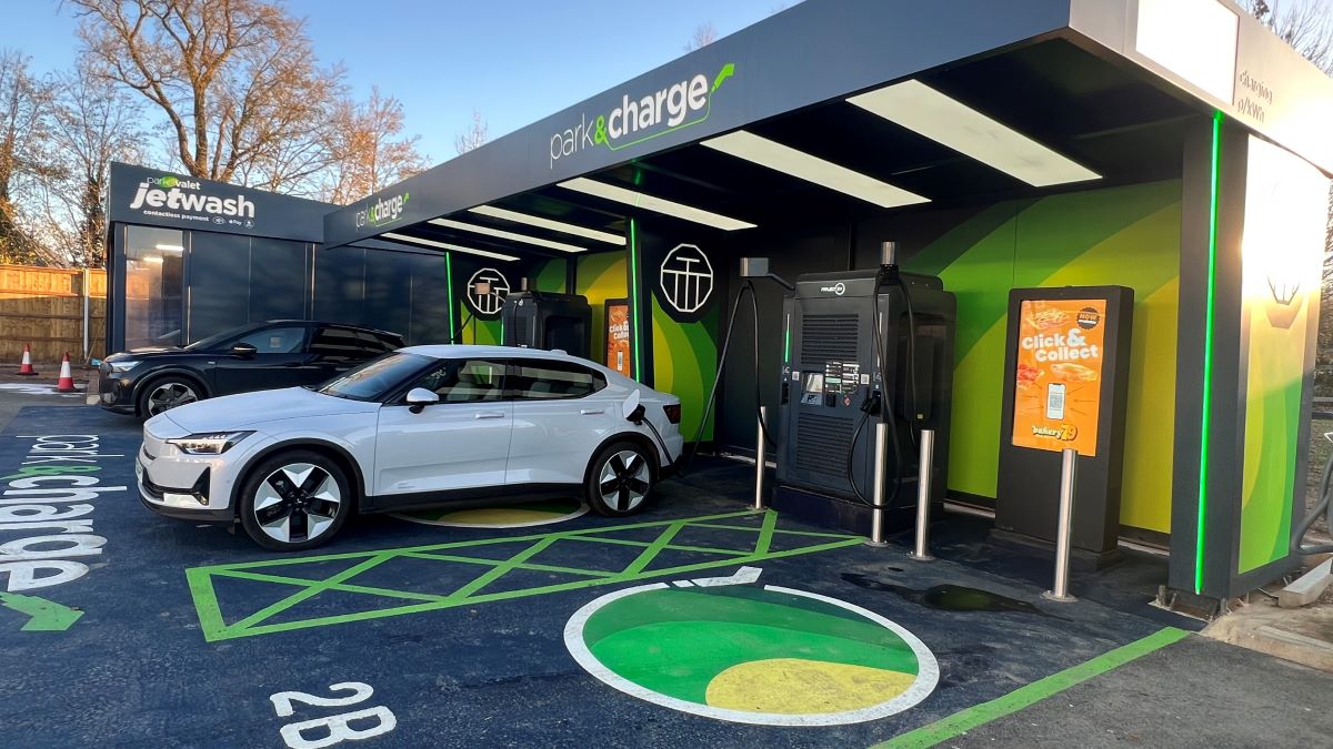 Park Garage Group charging hub with cars, chargers and a Bakery 79 click-and-collect display