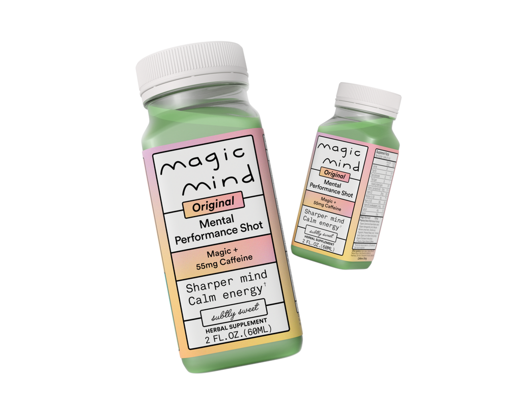 Two bottles of Magic Mind mental performance shot