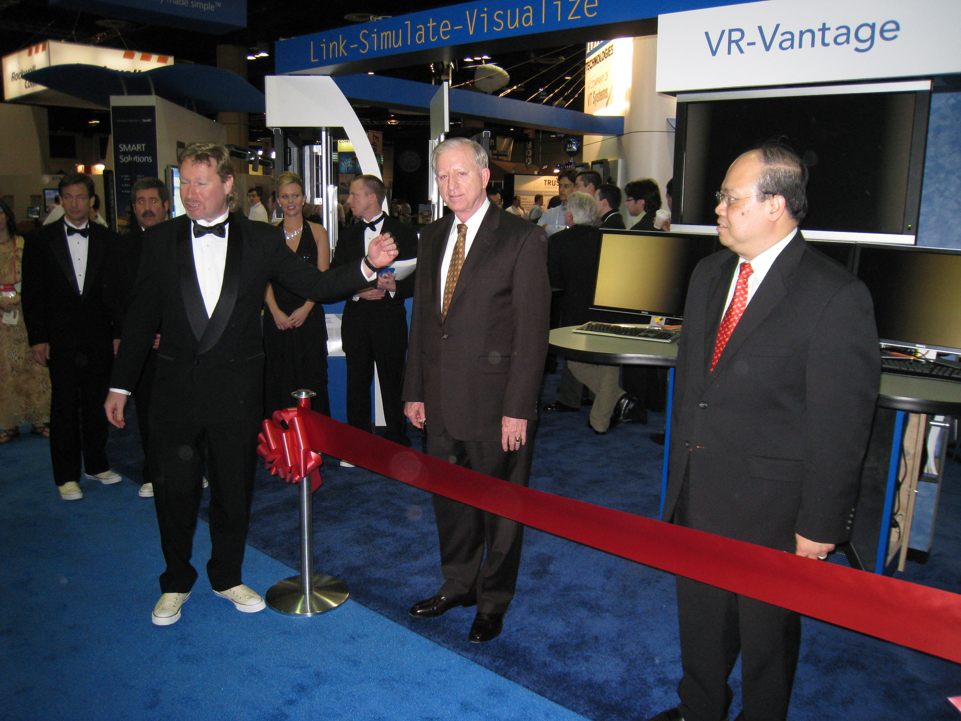 Historical MAK exhibition photograph showing a ribbon-cutting in front of a VR-Vantage display
