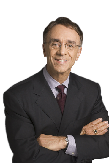 Ken Makovsky in a dark suit, photographed against a white background