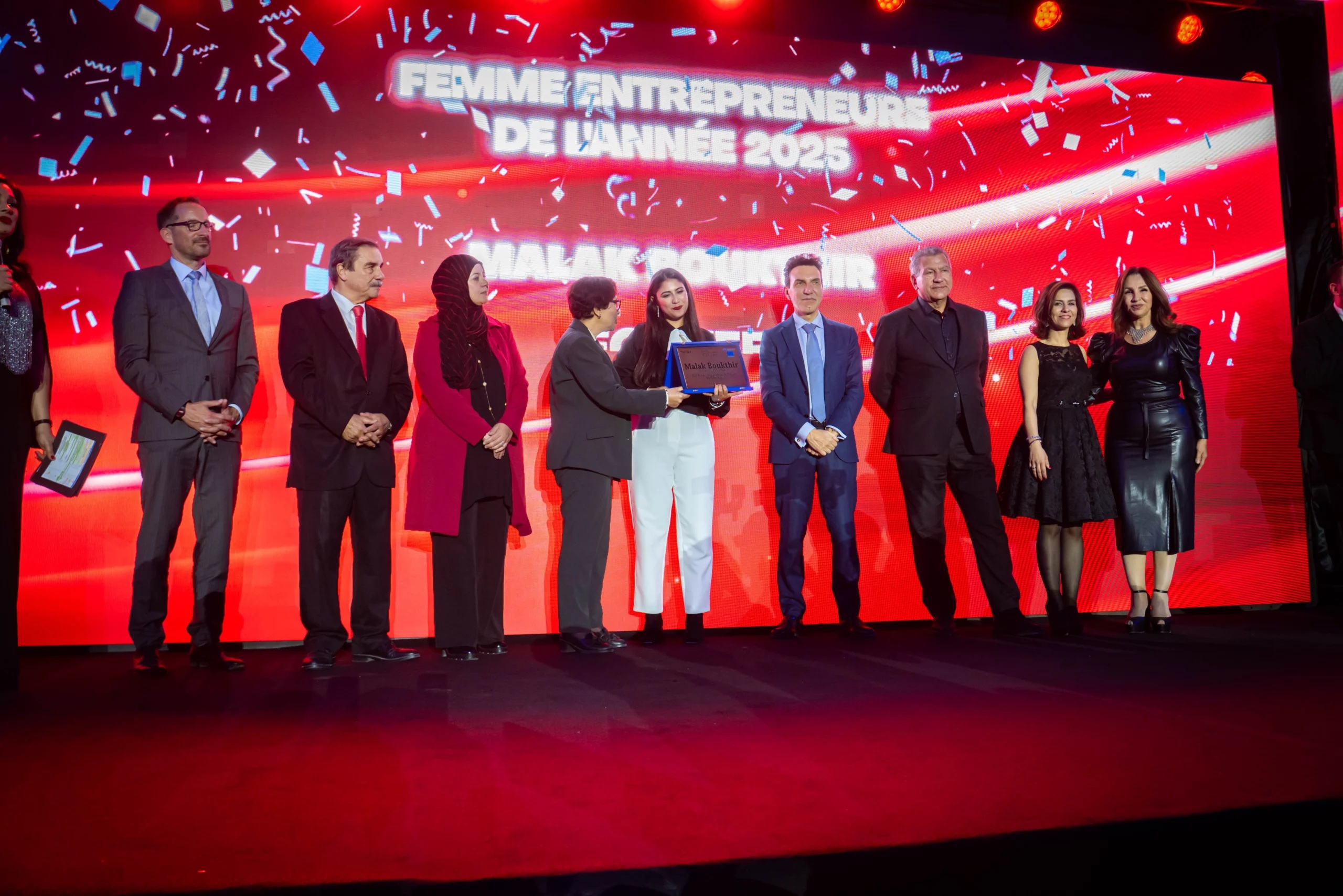 Ecofeed founder Malak Boukthir receiving the 2025 FET award onstage with officials and organisers