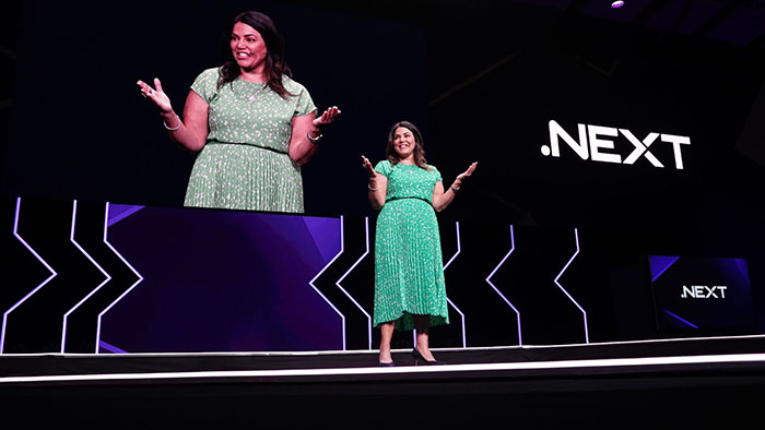 Mandy Dhaliwal speaking onstage at the Nutanix .NEXT conference in 2023