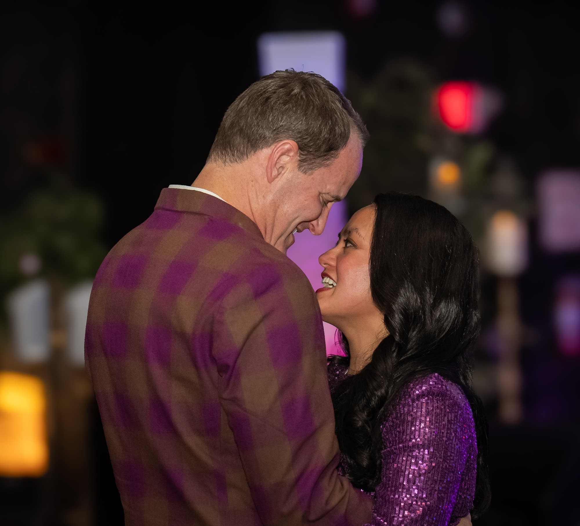 Paul Johnston and Mandy Tuong smiling at each other